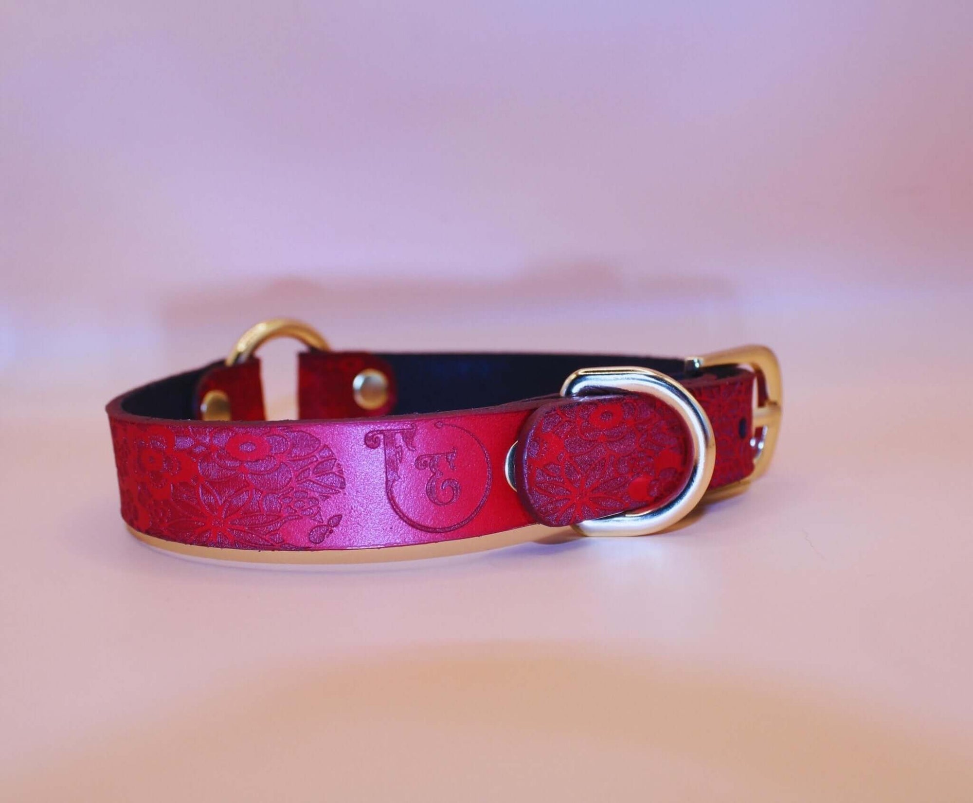 Elegant red floral submissive collar with gold O-ring, perfect for BDSM, bondage gear, and discreet day wear.
