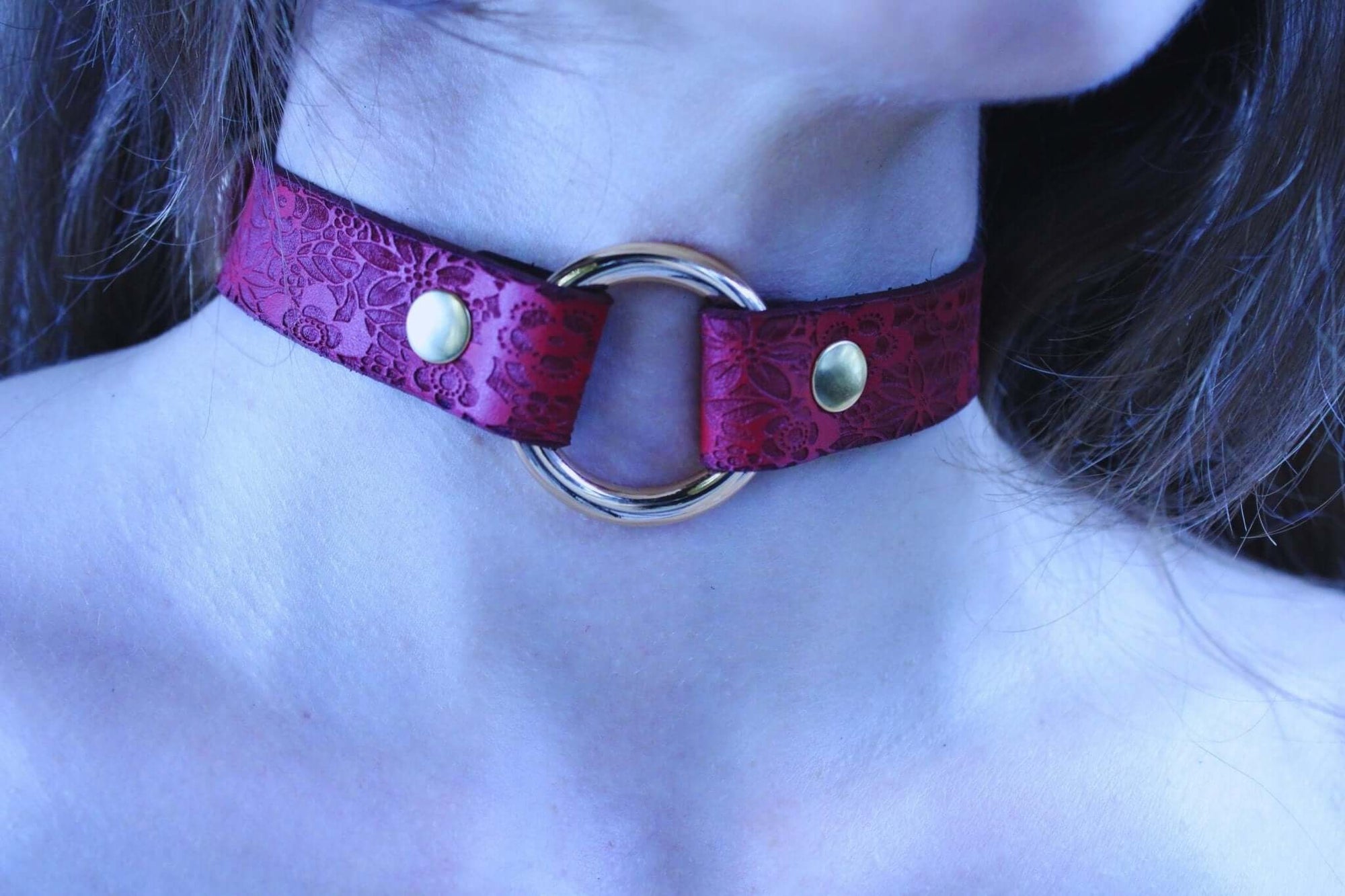 Elegant red floral leather submissive collar with gold O-ring, perfect for BDSM jewelry and sub collar discreet wear.