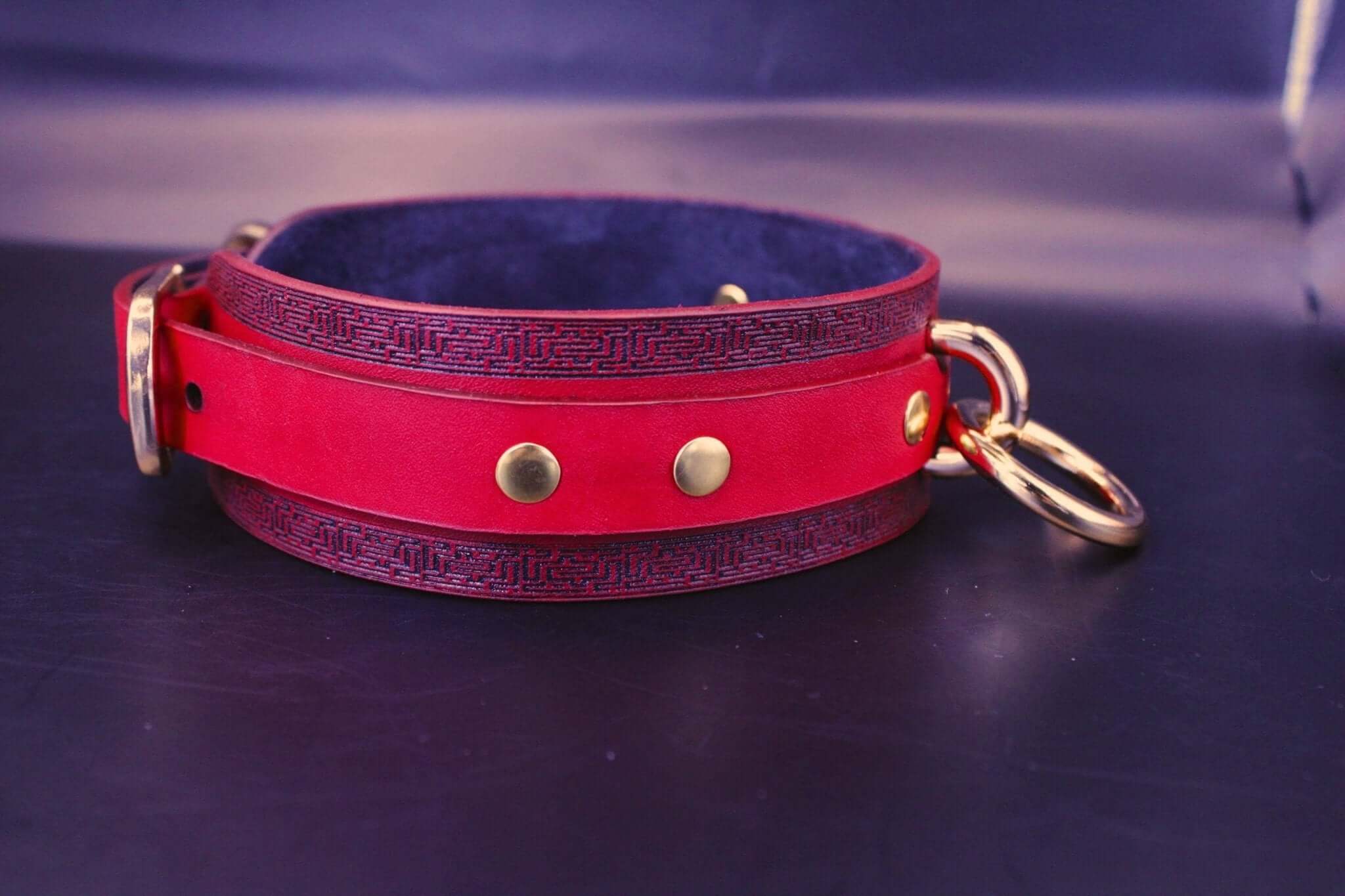 Handmade red leather choker collar with gold accents, perfect for bdsm jewelry and discreet day collar styling.