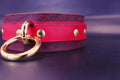 Handmade red leather choker collar with gold hardware, ideal for BDSM, discreet day wear, and submissive jewelry.