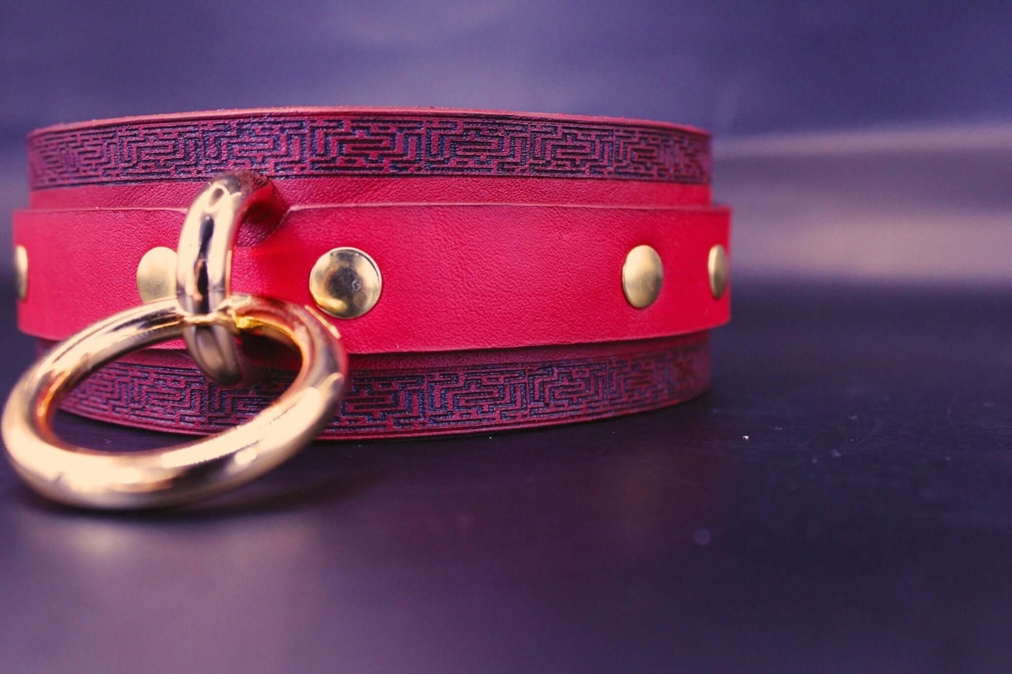 Handmade red leather choker collar with gold hardware, ideal for BDSM, discreet day wear, and submissive jewelry.