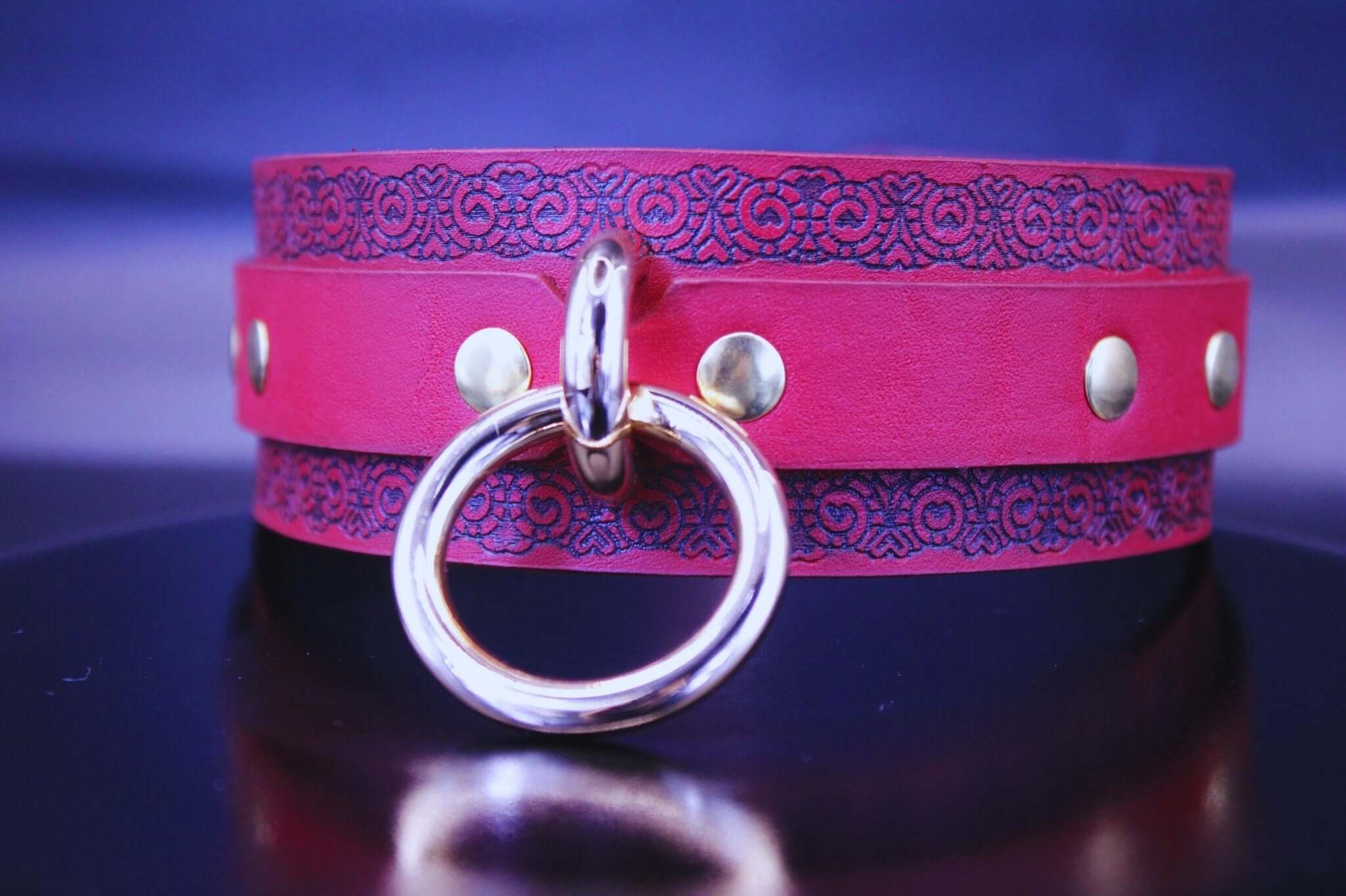 Red ornamental submissive collar with gothic pattern and metal ring, perfect for bdsm, bondage gear, and dom sub gifts.