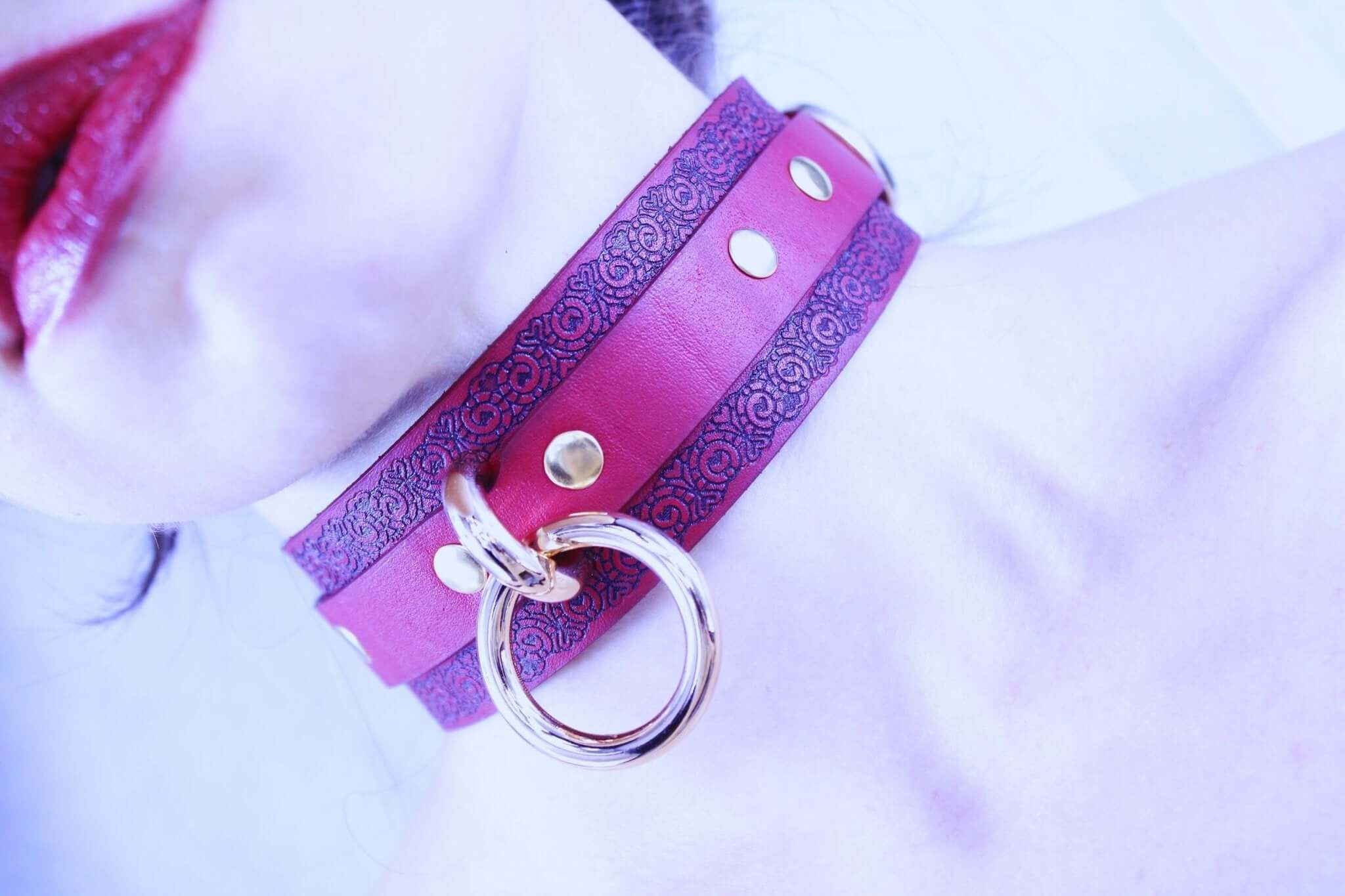 Red ornamental submissive collar with gothic pattern, perfect for BDSM and as a statement piece in bondage gear.