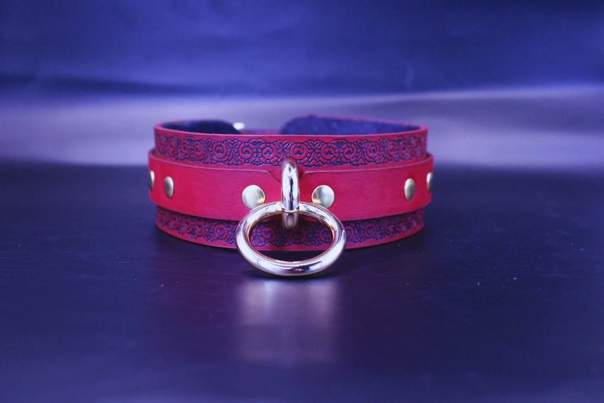 Red ornamental submissive collar with gothic pattern, perfect for BDSM, bondage gear, and dom sub gifts.