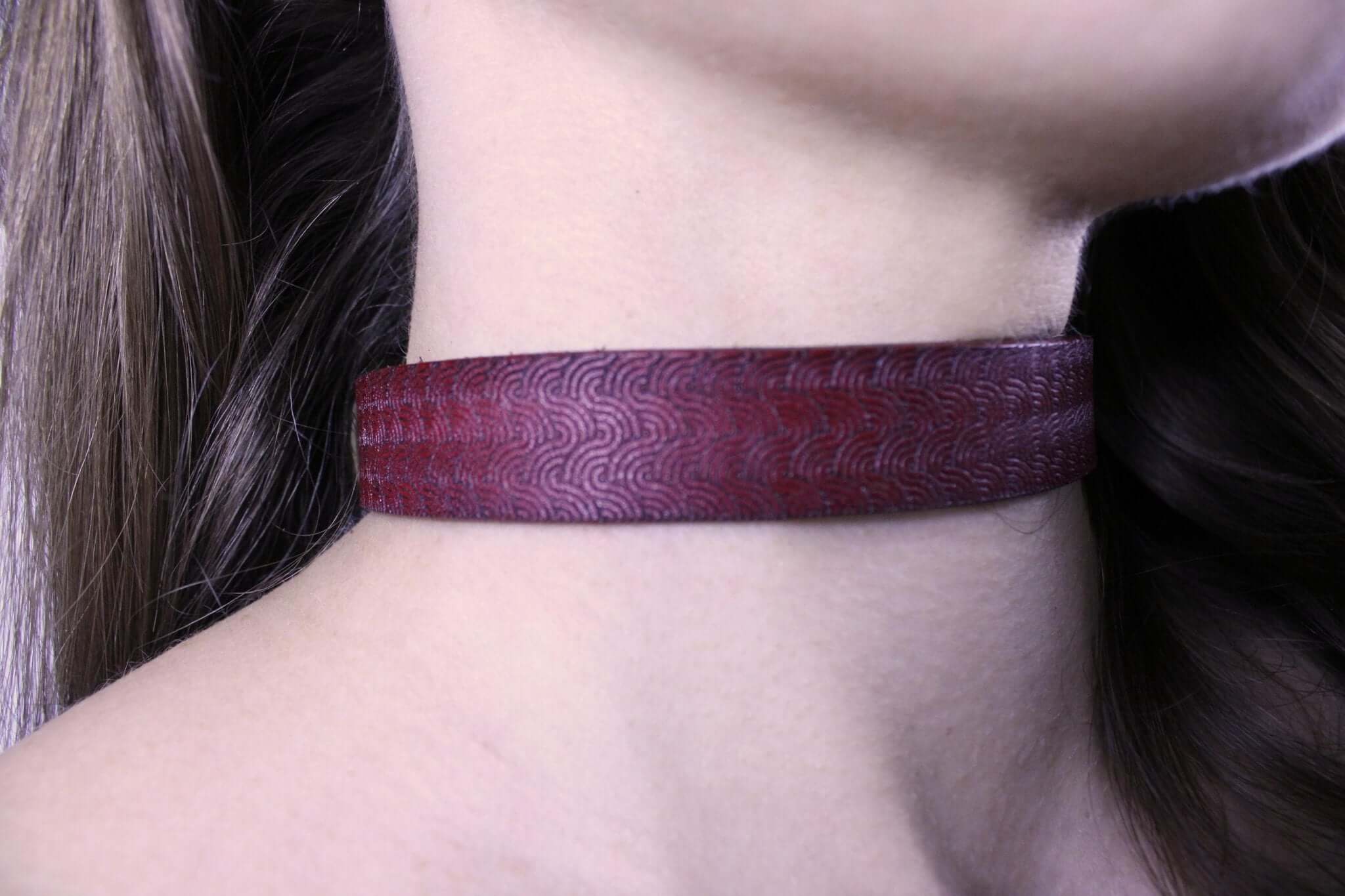 Red patterned handmade sub collar, ideal BDSM day collar for discreet wear and elegance in submissive jewelry.