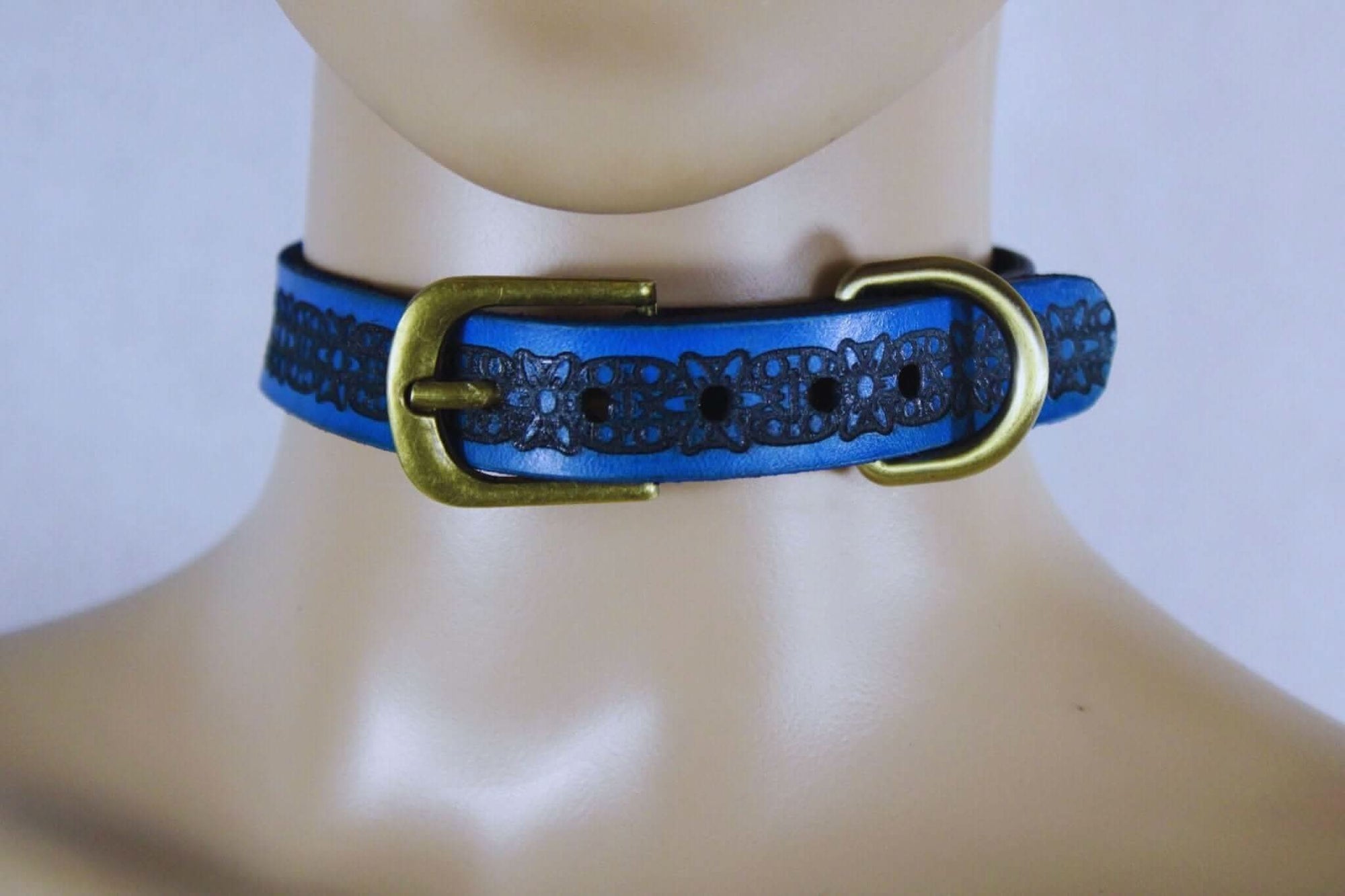 Royal Blue submissive collar with black floral pattern, perfect for BDSM outfits and discreet daywear.