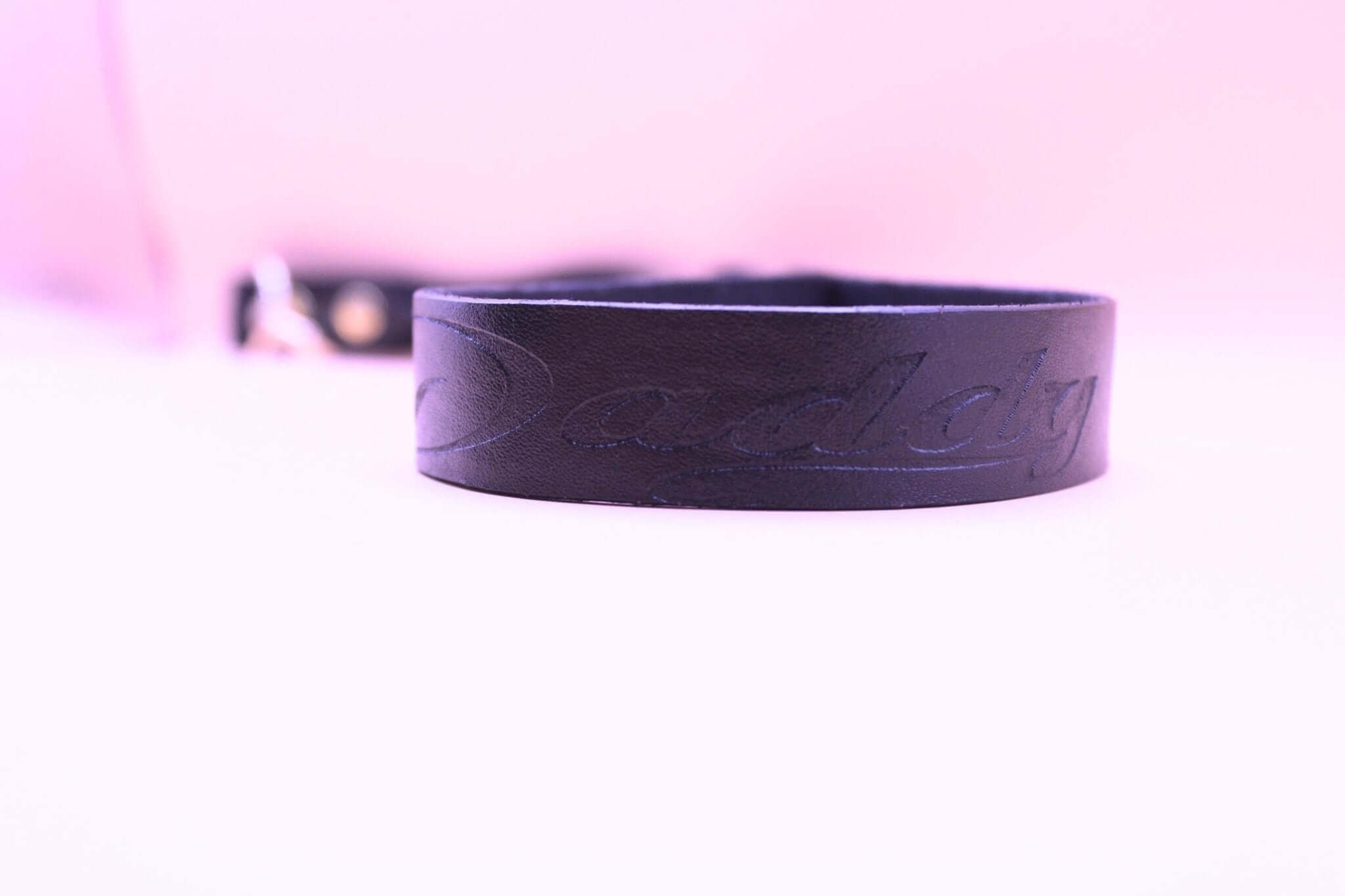 Premium leather BDSM leash with 'Daddy' engraving, ideal for dominance, submissive play, and bondage gear.