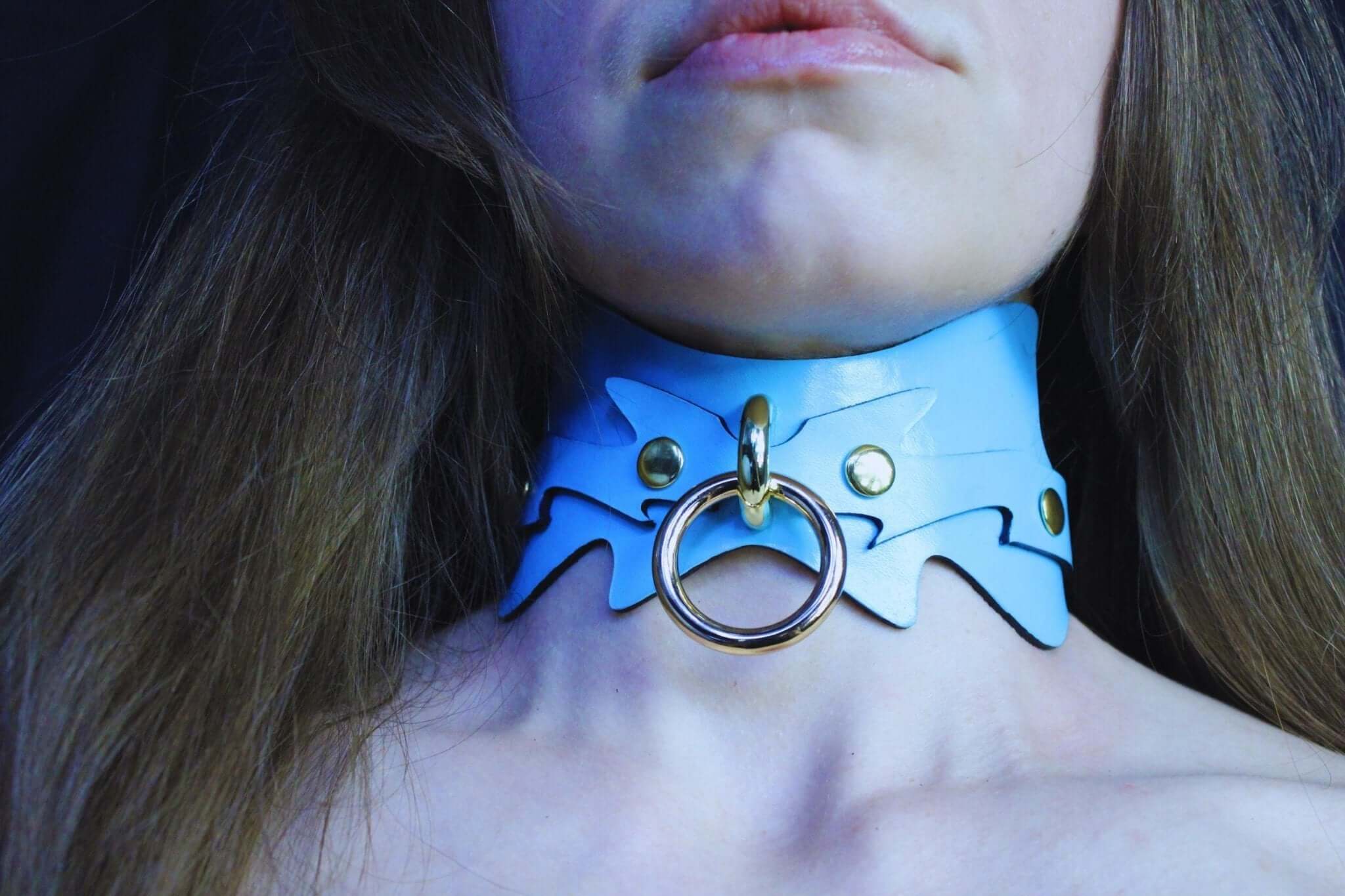 Sky blue submissive collar with batwing cut and O-ring, perfect for BDSM, bondage gear, and petplay dynamics.