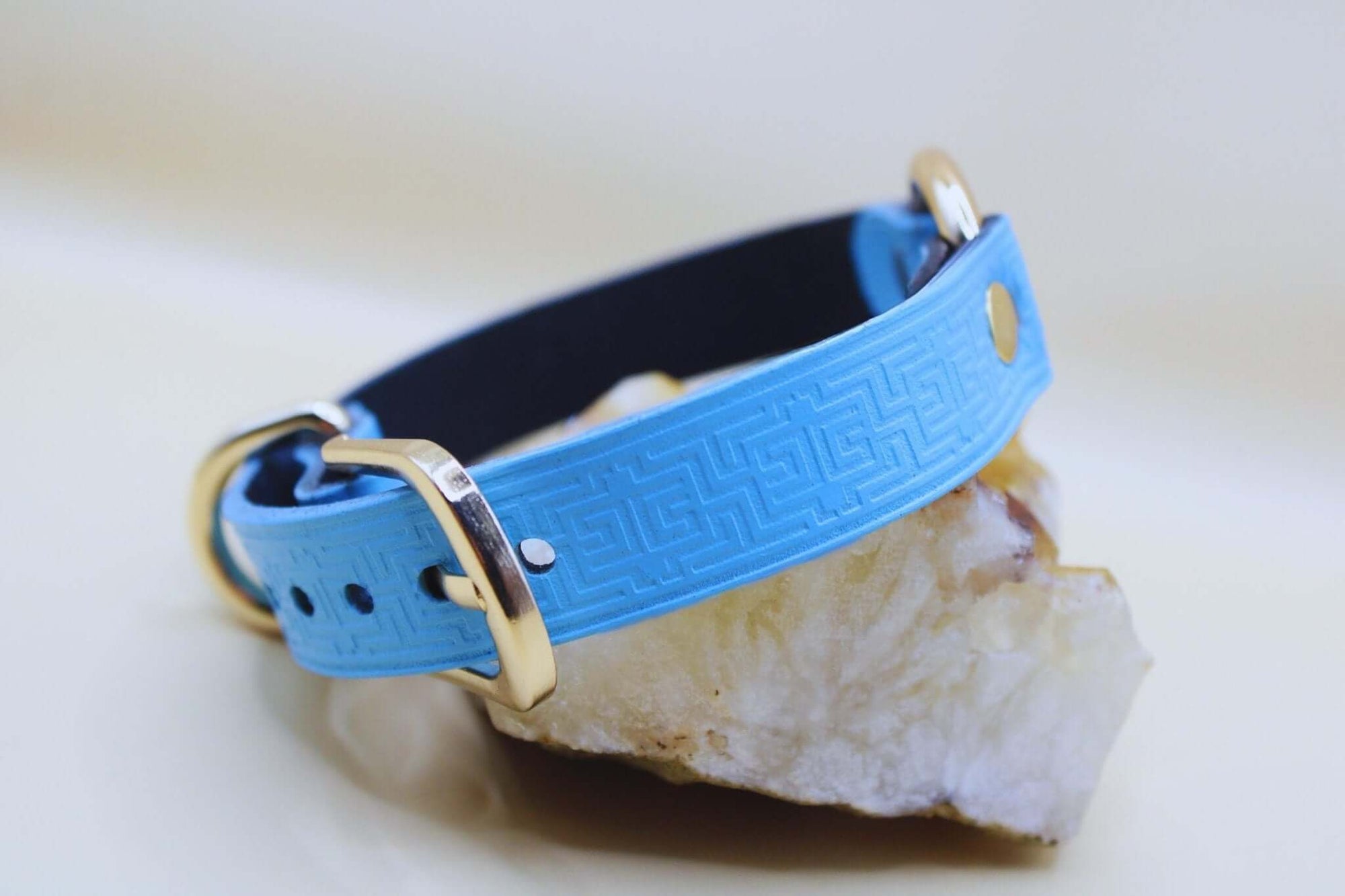 Sky blue leather submissive collar with geometric pattern, perfect for BDSM and discreet day wear.