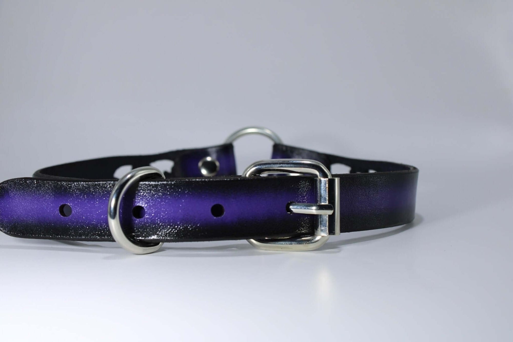 Gothic purple leather BDSM collar with O-rings, perfect for submissive jewelry and alternative kink fashion.