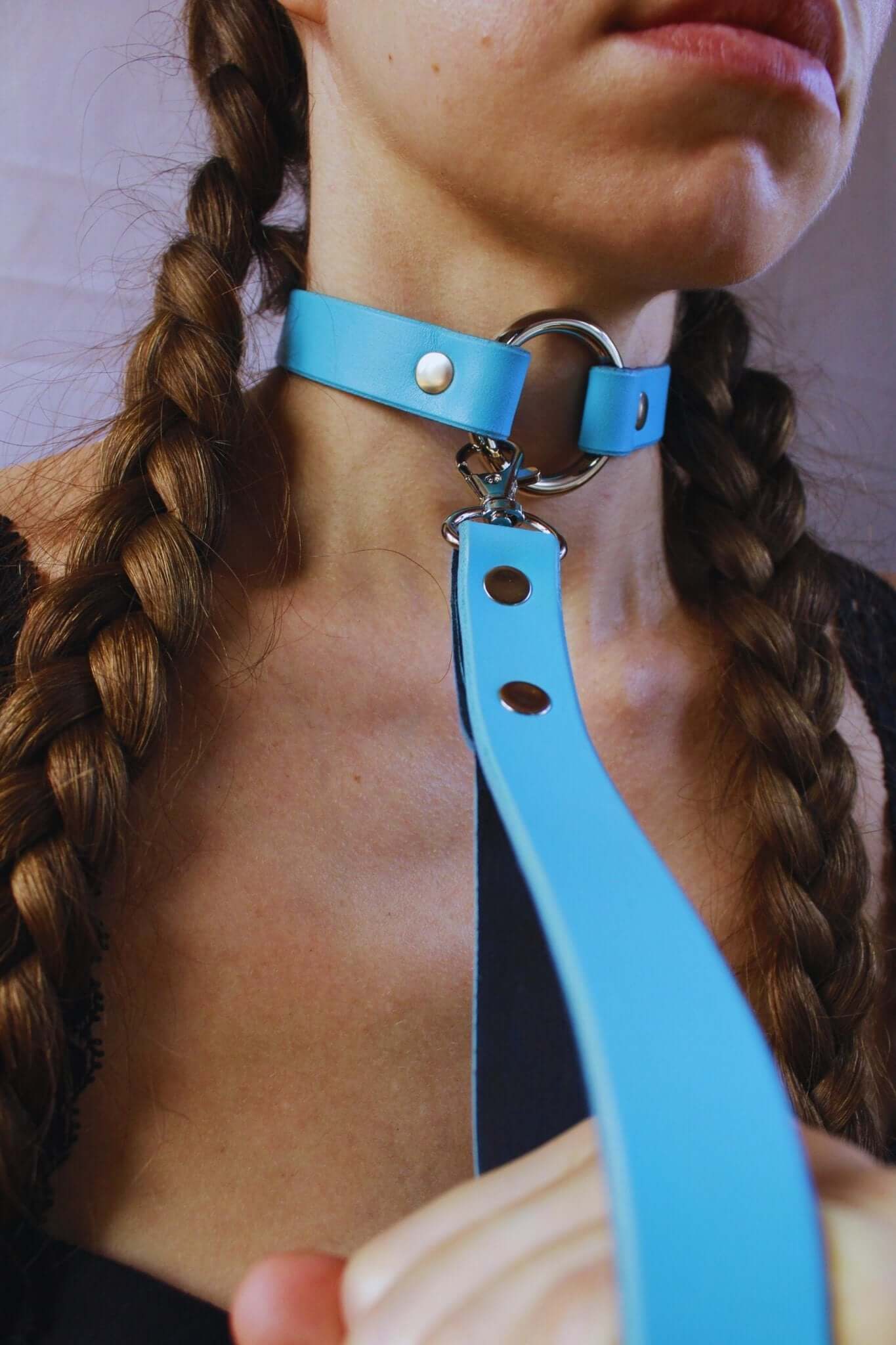 Blue leather discreet collar with leash for BDSM and submissive jewelry, perfect for bondage and self-bondage expressions.