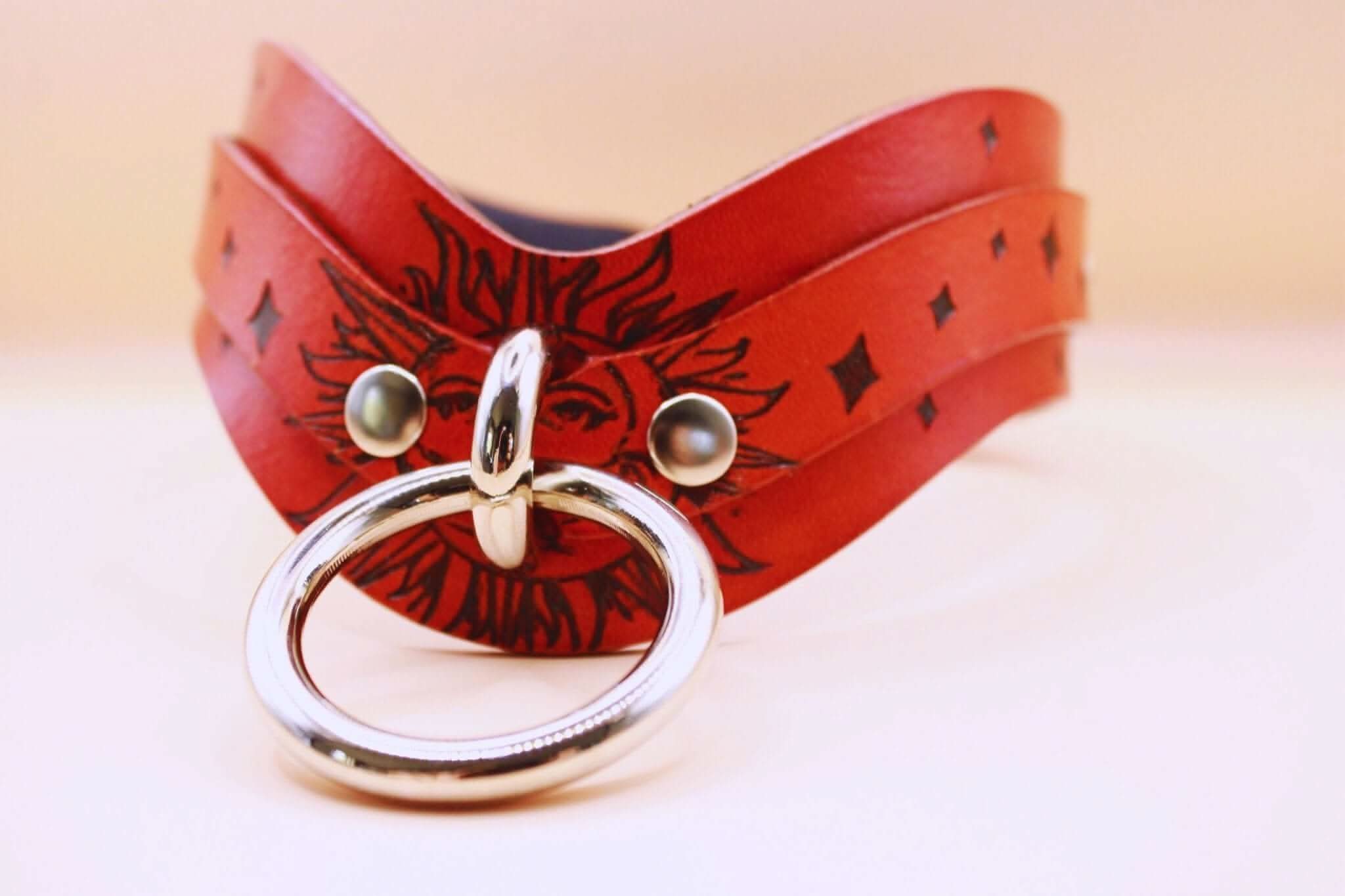 Sun Design BDSM collar in red leather with a metal ring, perfect as a discreet day collar and submissive jewelry.